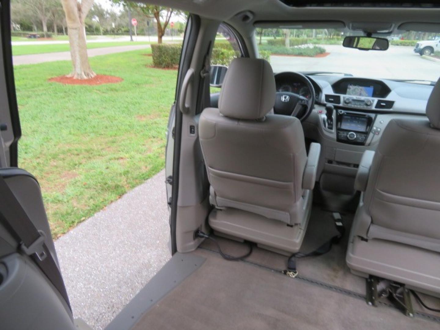 2014 Silver /GRAY Honda Odyssey EX-L (5FNRL5H68EB) with an 3.5L V6 SOHC 24V engine, 6-Speed Automatic transmission, located at 4301 Oak Circle #19, Boca Raton, FL, 33431, (954) 561-2499, 26.388861, -80.084038 - You are looking at Gorgeous Low Mileage 2014 Honda Odyssey EX-L Braunability Freedom Van Handicap Van Wheelchair Van Conversion Van with 25K Original Miles, Power Side Entry Ramp with Kneeling Van Function, Passenger Side Quick Lock System (same as ez lock), Quick Release Front Seats, Tie Down Syste - Photo#69